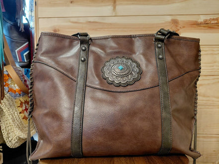 Brown Leather Tote Bag with Decorative Medallion