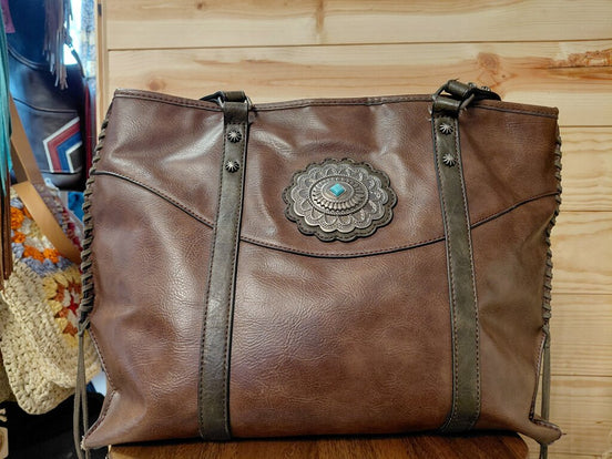 Brown Leather Tote Bag with Decorative Medallion