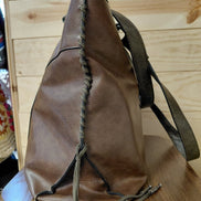 Brown Leather Tote Bag with Decorative Medallion
