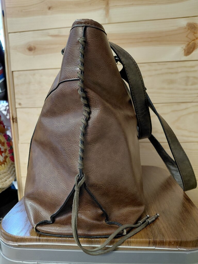 Brown Leather Tote Bag with Decorative Medallion