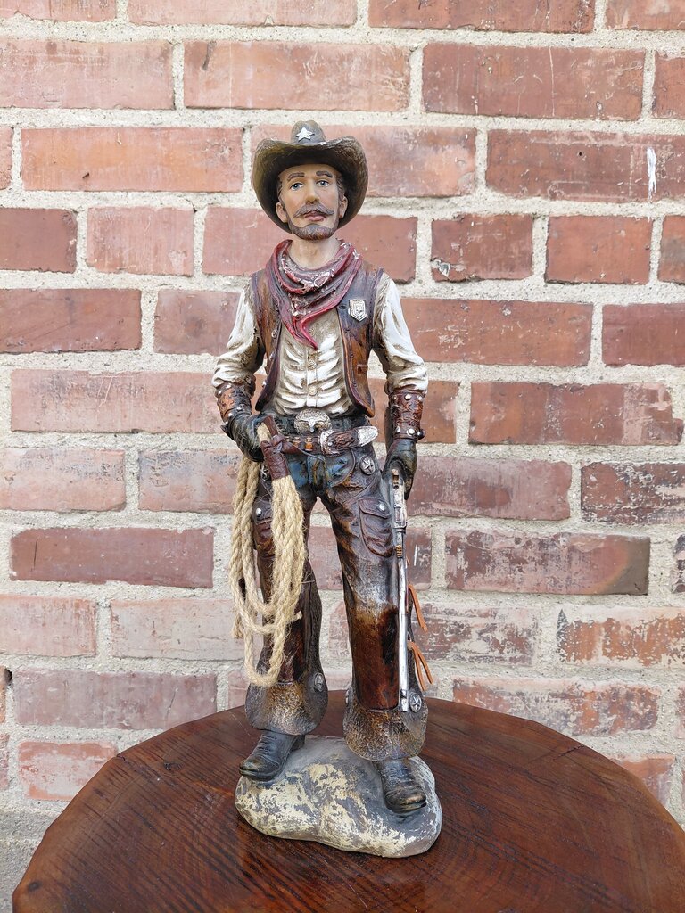 Cowboy Figurine with Lasso and Revolver