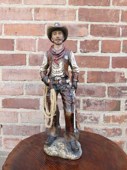 Cowboy Figurine with Lasso and Revolver