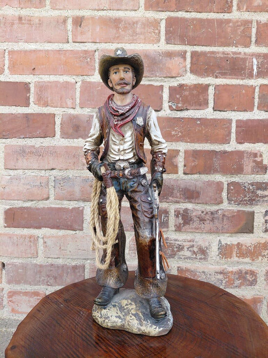 Cowboy Figurine with Lasso and Revolver